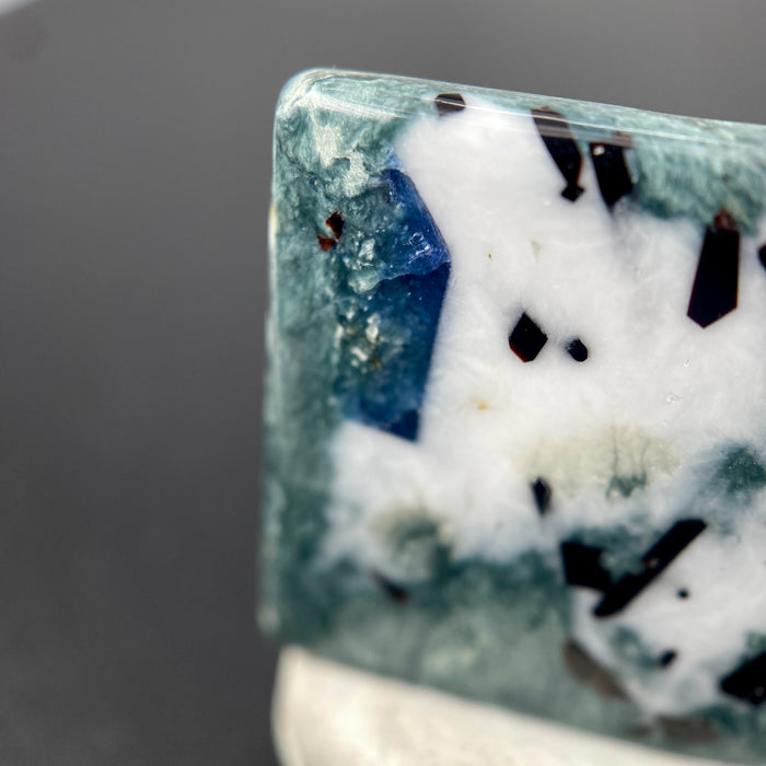 14.03 ct. Rare Benitoite on Natrolite  and Crossite Matrix with Neptunite Cabochon