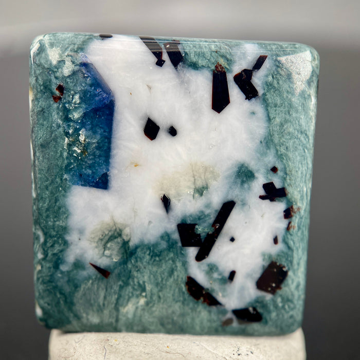 14.03 ct. Rare Benitoite on Natrolite  and Crossite Matrix with Neptunite Cabochon