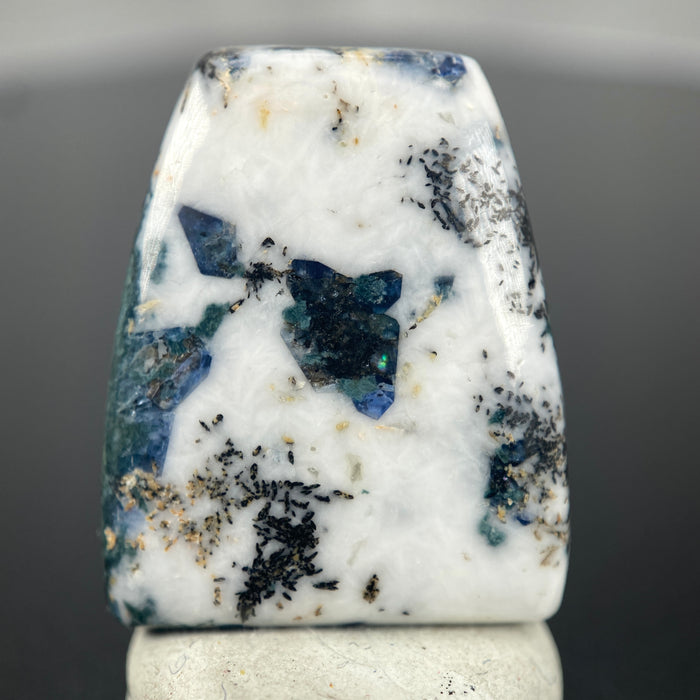 18.79 ct. Rare Benitoite on Natrolite  and Crossite Matrix with Neptunite and Joaquinite Cabochon