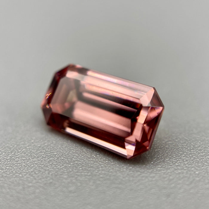 2.54 carat antique rose colored emerald cut zircon gemstone from mozambique available on sanctuary of stones dot com photo 1