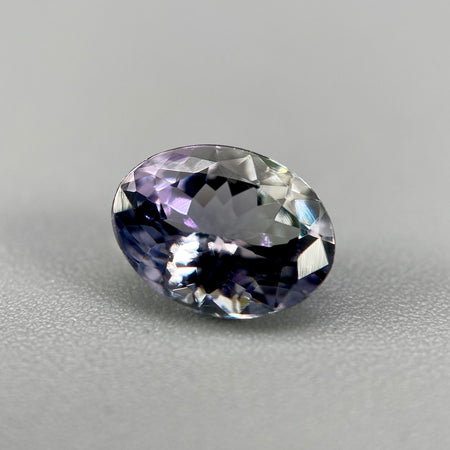 Unheated peacock tanzanite oval gemstone weighing 1.21 carats available on sanctuary of stones dot com photo 2