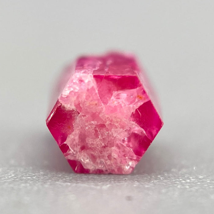 extremely rare red beryl (bixbite) crystal raspberry red hexagonal crystal of 0.56 carats available at sanctuaryofstones.com