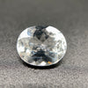 rare brazilian phenakite gemstone faceted oval shape on black background. available at sanctuaryofstones.com