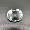 rare brazilian phenakite gemstone faceted oval shape on black background. available at sanctuaryofstones.com