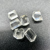 6-piece lot short Burmese phenakite crystals on black background. available at sanctuaryofstones.com