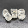 6-piece lot short Burmese phenakite crystals on black background. available at sanctuaryofstones.com