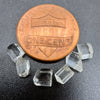 6-piece lot of short, fat, stubby Burmese phenakite crystals on black background. available at sanctuaryofstones.com