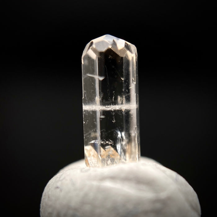 0.455 carat Burmese phenakite drill bit crystal for sale, glass clear, natural termination available at sanctuaryofstones.com photo 1
