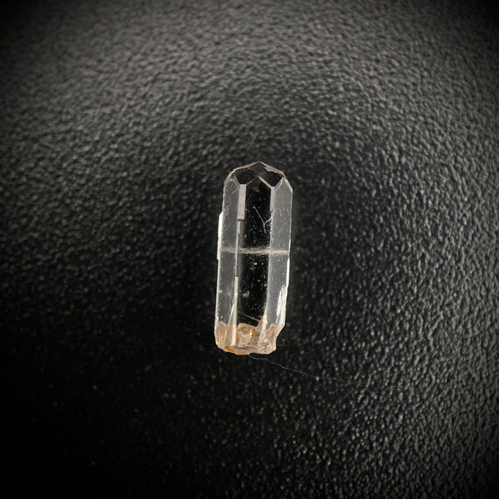 0.455 carat Burmese phenakite drill bit crystal for sale, glass clear, natural termination available at sanctuaryofstones.com photo 4