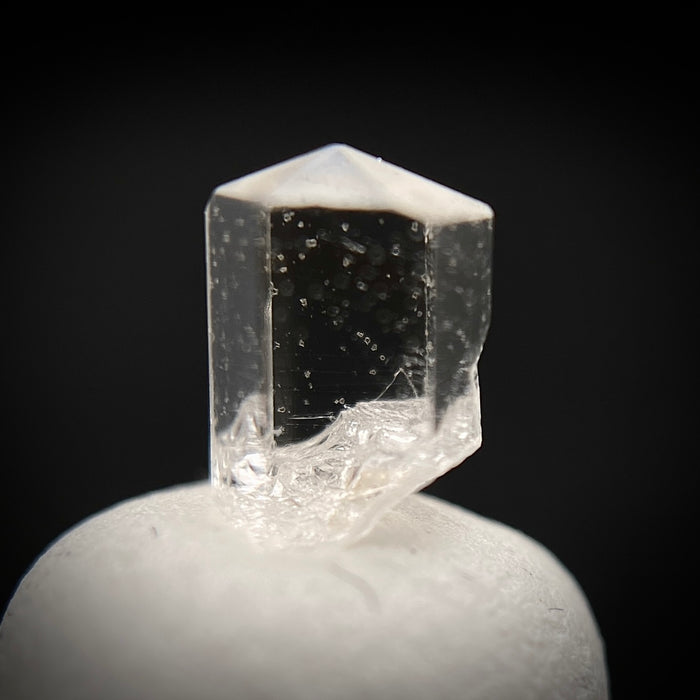 0.48 carat Burmese phenakite drill bit crystal for sale, glass clear, natural termination available at sanctuaryofstones.com photo 1
