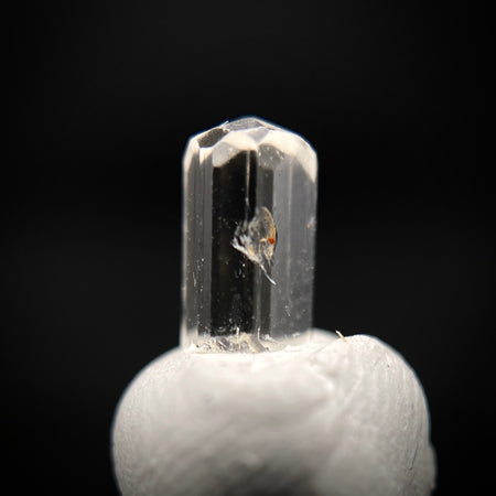 0.49 carat Burmese phenakite drill bit crystal for sale, glass clear, natural termination available at sanctuaryofstones.com photo 1