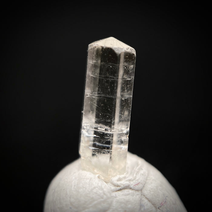 0.52 carat Burmese phenakite drill bit crystal for sale, glass clear, natural termination available at sanctuaryofstones.com photo 2