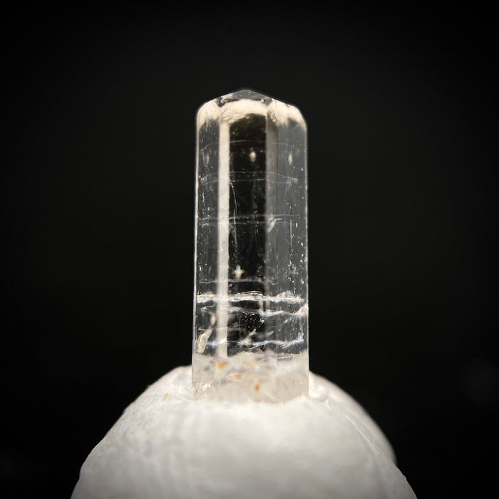 0.52 carat Burmese phenakite drill bit crystal for sale, glass clear, natural termination available at sanctuaryofstones.com photo 1
