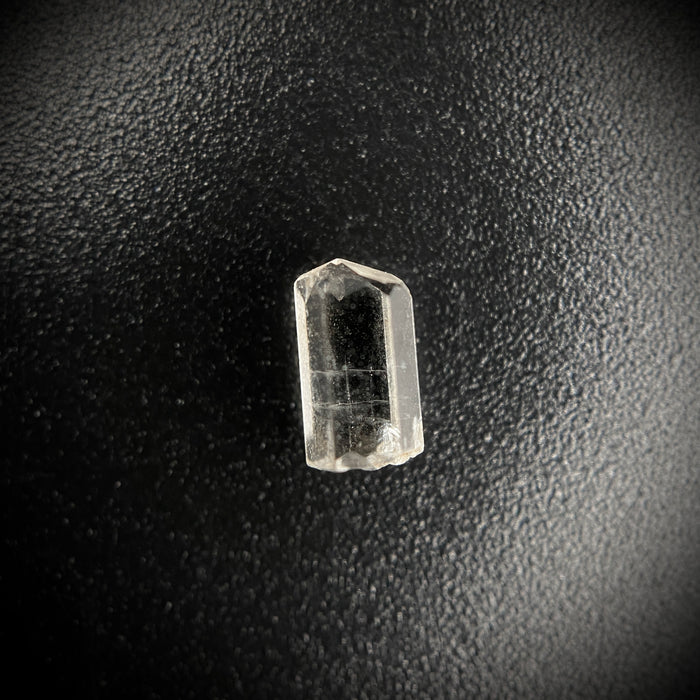 0.54 carat Burmese phenakite drill bit crystal for sale, glass clear, natural termination available at sanctuaryofstones.com photo 2