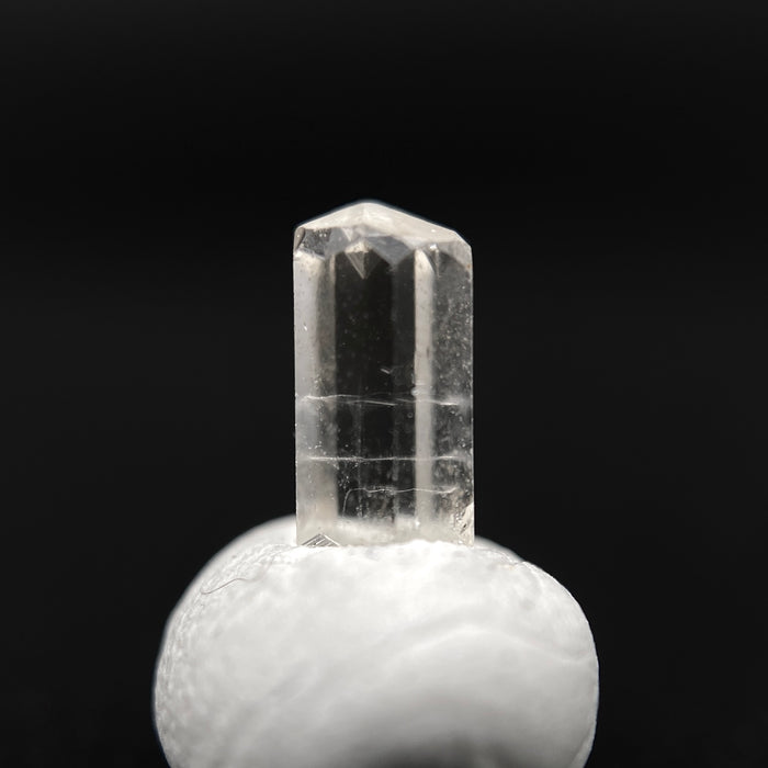 0.54 carat Burmese phenakite drill bit crystal for sale, glass clear, natural termination available at sanctuaryofstones.com photo 4