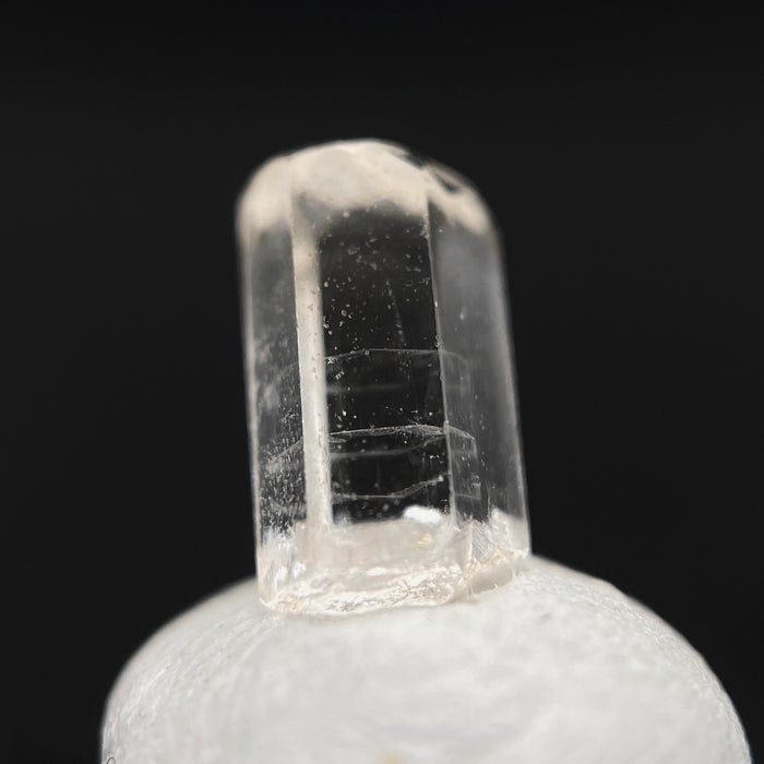 0.54 carat Burmese phenakite drill bit crystal for sale, glass clear, natural termination available at sanctuaryofstones.com photo 8