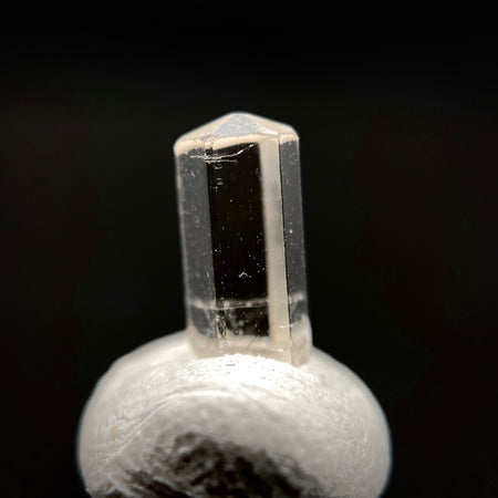 0.55 carat Burmese phenakite drill bit crystal for sale, glass clear, natural termination available at sanctuaryofstones.com photo 4