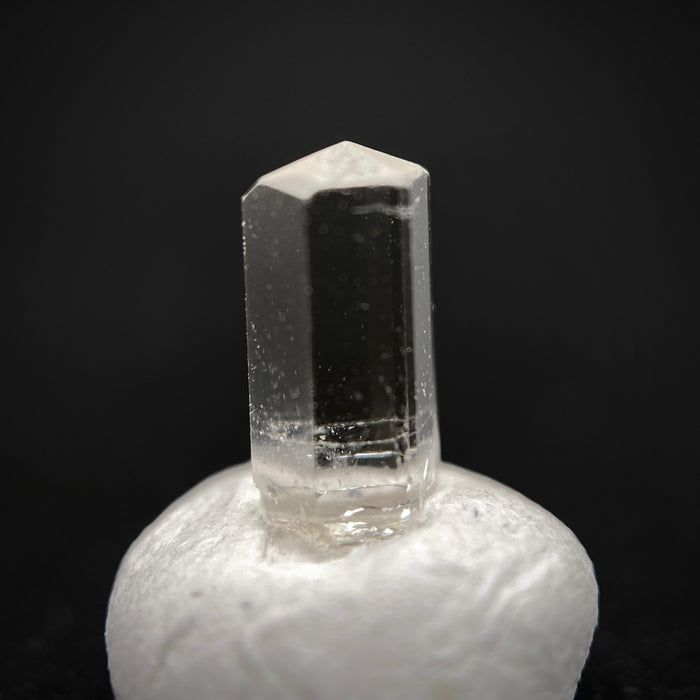 0.55 carat Burmese phenakite drill bit crystal for sale, glass clear, natural termination available at sanctuaryofstones.com photo 7