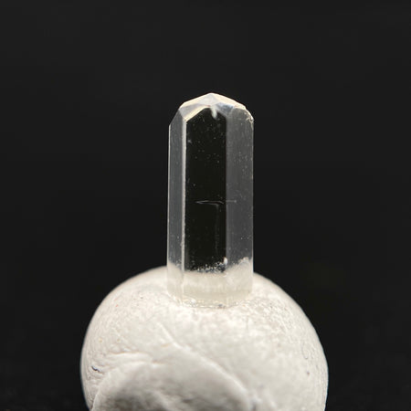0.56 carat Burmese phenakite drill bit crystal for sale, glass clear, natural termination available at sanctuaryofstones.com photo 1