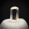 0.24 carat Burmese phenakite drill bit crystal for sale, glass clear, natural termination available at sanctuaryofstones.com photo 1
