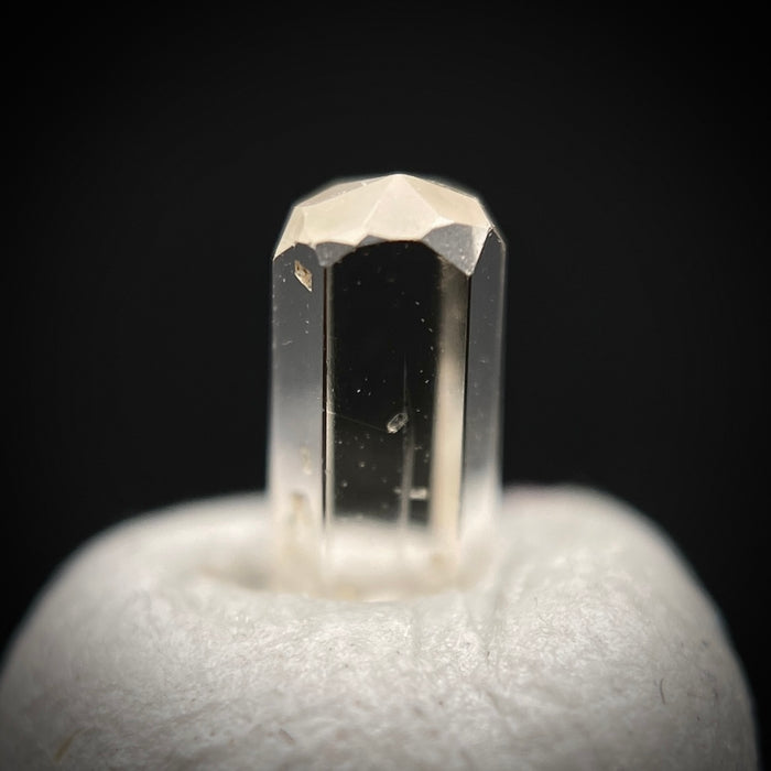 0.24 carat Burmese phenakite drill bit crystal for sale, glass clear, natural termination available at sanctuaryofstones.com photo 1
