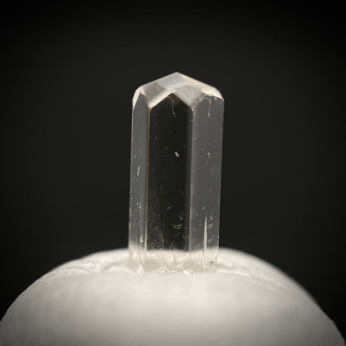 0.24 carat Burmese phenakite drill bit crystal for sale, glass clear, natural termination available at sanctuaryofstones.com photo 2