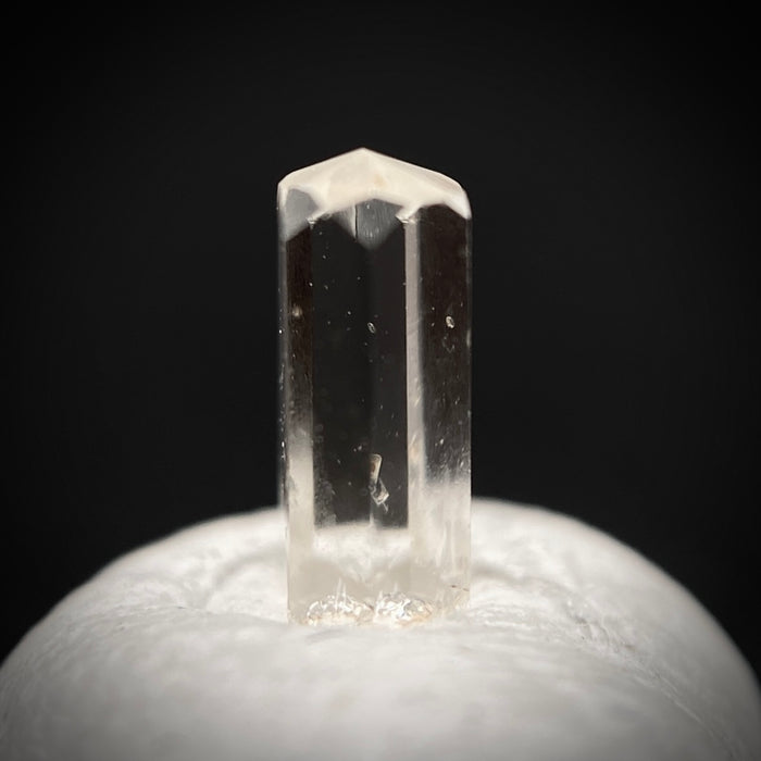 0.24 carat Burmese phenakite drill bit crystal for sale, glass clear, natural termination available at sanctuaryofstones.com photo 3