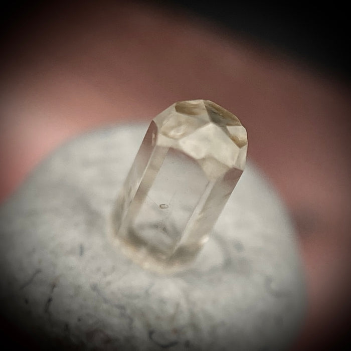 0.24 carat Burmese phenakite drill bit crystal for sale, glass clear, natural termination available at sanctuaryofstones.com photo 7