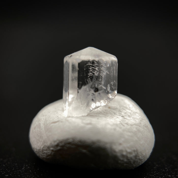 0.57 carat Burmese phenakite drill bit crystal for sale, glass clear, natural termination available at sanctuaryofstones.com photo 4