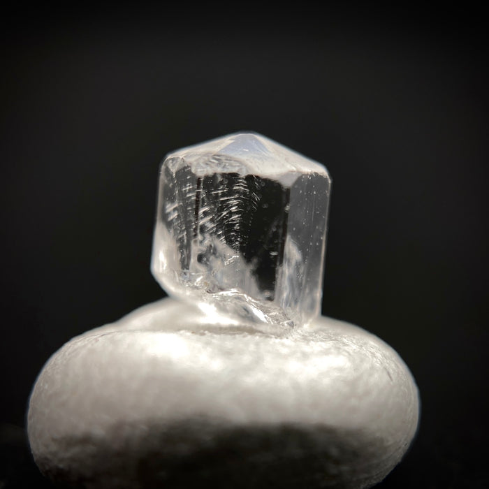 0.57 carat Burmese phenakite drill bit crystal for sale, glass clear, natural termination available at sanctuaryofstones.com photo 6