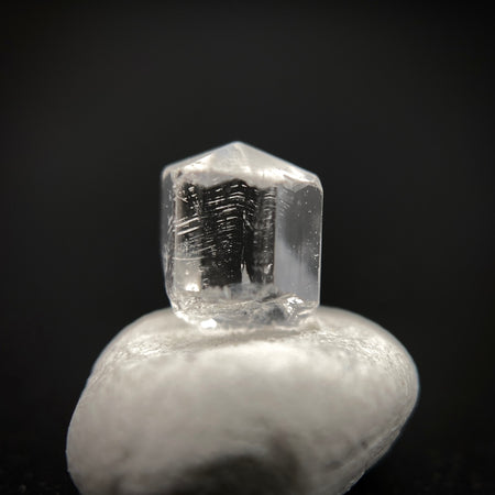 0.57 carat Burmese phenakite drill bit crystal for sale, glass clear, natural termination available at sanctuaryofstones.com photo 7