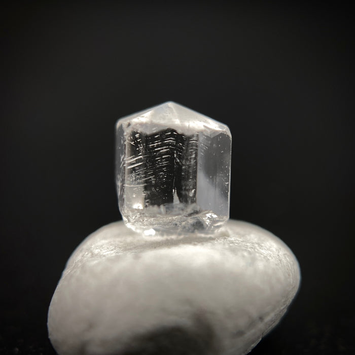 0.57 carat Burmese phenakite drill bit crystal for sale, glass clear, natural termination available at sanctuaryofstones.com photo 7