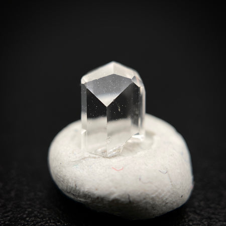 0.57 carat Burmese phenakite drill bit crystal for sale, glass clear, natural termination available at sanctuaryofstones.com photo 4