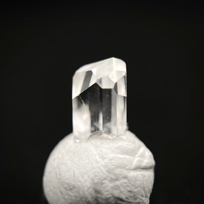 0.57 carat Burmese phenakite drill bit crystal for sale, glass clear, natural termination available at sanctuaryofstones.com photo 7