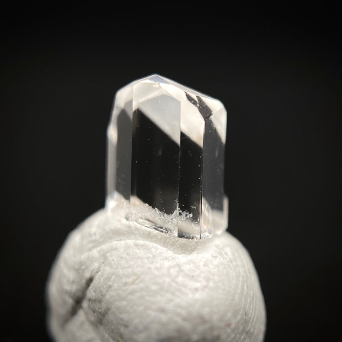 0.57 carat Burmese phenakite drill bit crystal for sale, glass clear, natural termination available at sanctuaryofstones.com photo 9