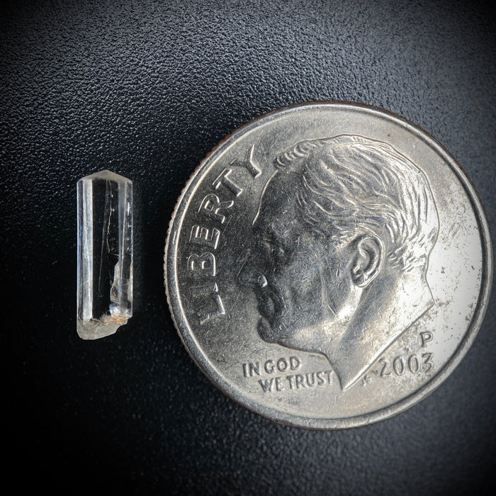 0.57 carat Burmese phenakite drill bit crystal for sale, glass clear, natural termination available at sanctuaryofstones.com photo 2