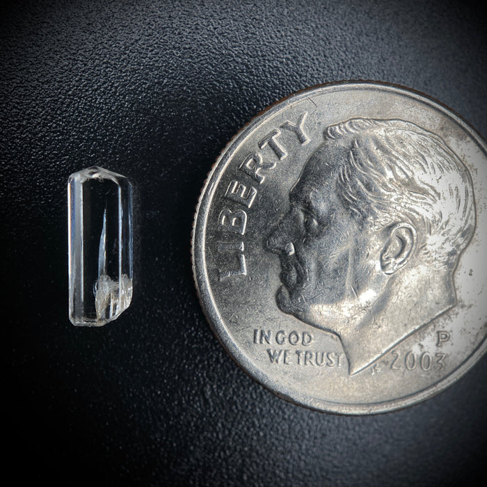 0.58 carat Burmese phenakite drill bit crystal for sale, glass clear, natural termination available at sanctuaryofstones.com photo 2