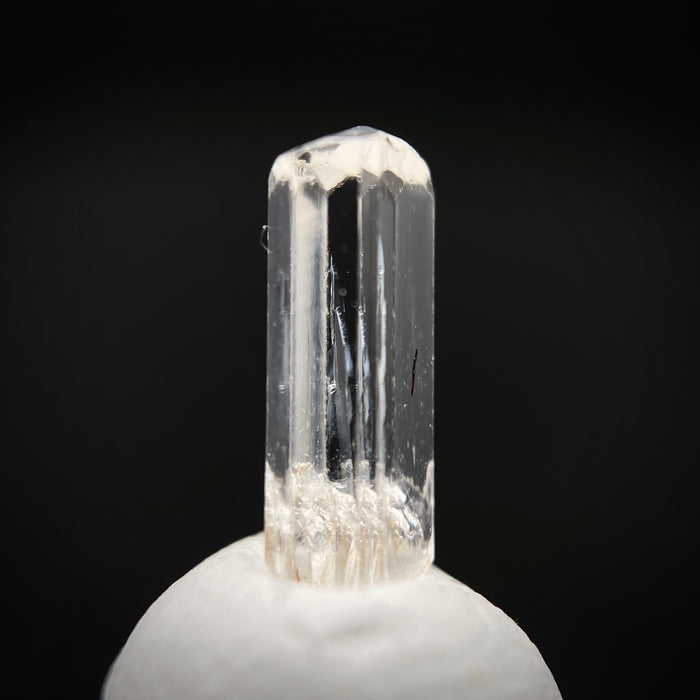0.58 carat Burmese phenakite drill bit crystal for sale, glass clear, natural termination available at sanctuaryofstones.com photo 3