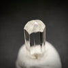 0.58 carat Burmese phenakite drill bit crystal for sale, glass clear, natural termination available at sanctuaryofstones.com photo 7