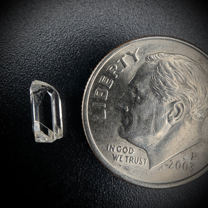 0.585 carat Burmese phenakite drill bit crystal for sale, glass clear, natural termination available at sanctuaryofstones.com photo 2
