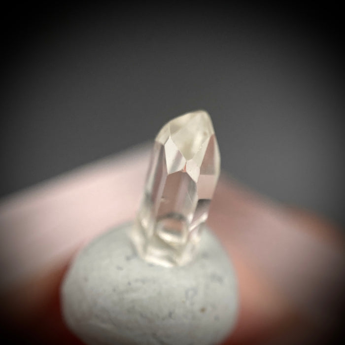 0.585 carat Burmese phenakite drill bit crystal for sale, glass clear, natural termination available at sanctuaryofstones.com photo 3