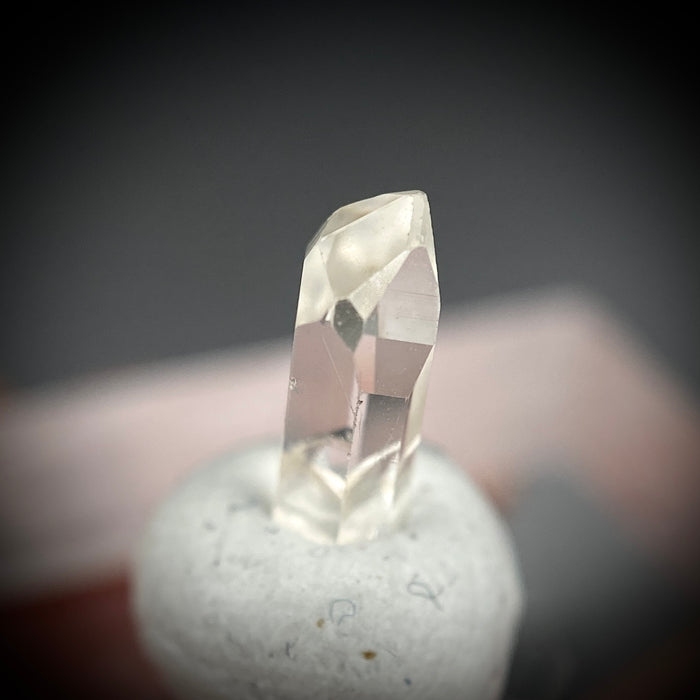 0.585 carat Burmese phenakite drill bit crystal for sale, glass clear, natural termination available at sanctuaryofstones.com photo 4