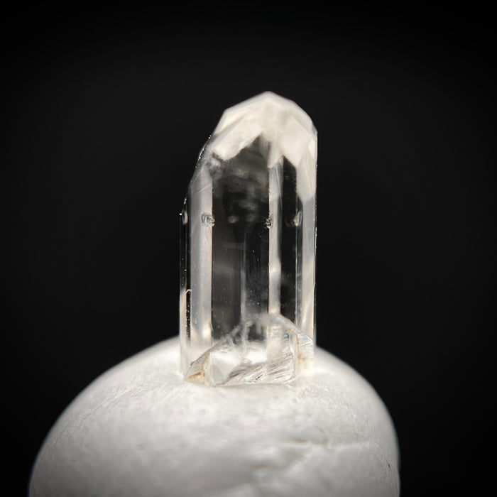 0.585 carat Burmese phenakite drill bit crystal for sale, glass clear, natural termination available at sanctuaryofstones.com photo 7
