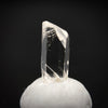 0.585 carat Burmese phenakite drill bit crystal for sale, glass clear, natural termination available at sanctuaryofstones.com photo 8