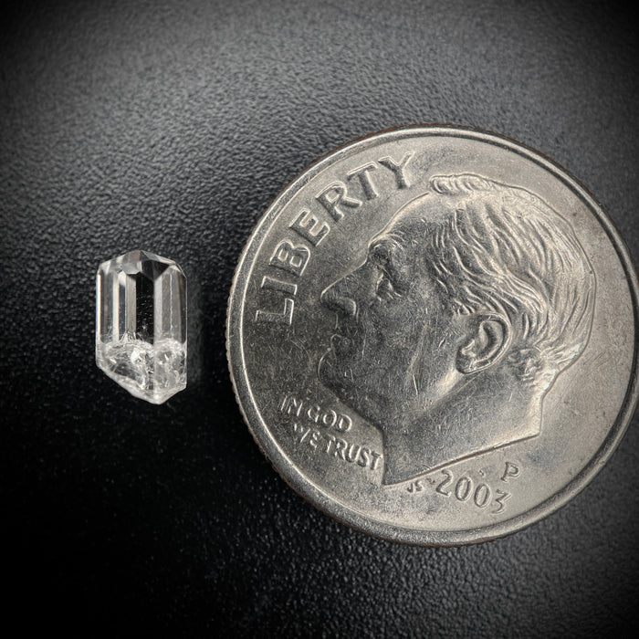 0.59 carat Burmese phenakite drill bit crystal for sale, glass clear, natural termination available at sanctuaryofstones.com photo 2