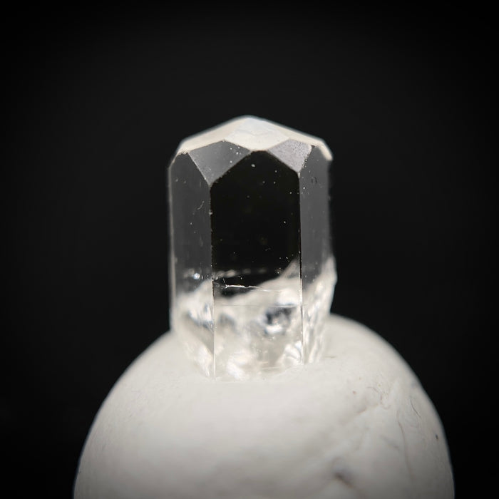 0.59 carat Burmese phenakite drill bit crystal for sale, glass clear, natural termination available at sanctuaryofstones.com photo 3