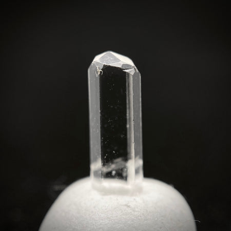 0.595 carat Burmese phenakite drill bit crystal for sale, glass clear, natural termination available at sanctuaryofstones.com photo 3