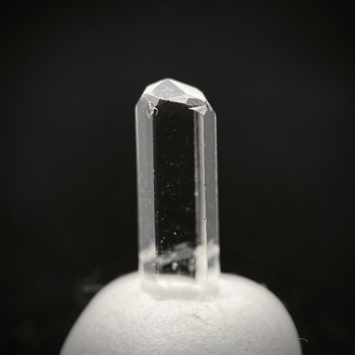 0.595 carat Burmese phenakite drill bit crystal for sale, glass clear, natural termination available at sanctuaryofstones.com photo 3
