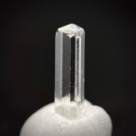 0.595 carat Burmese phenakite drill bit crystal for sale, glass clear, natural termination available at sanctuaryofstones.com photo 4