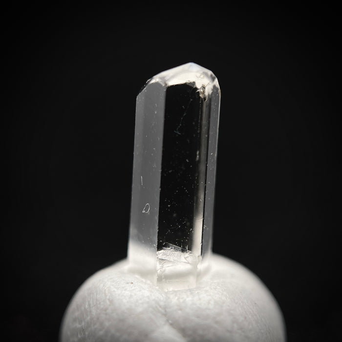 0.595 carat Burmese phenakite drill bit crystal for sale, glass clear, natural termination available at sanctuaryofstones.com photo 6